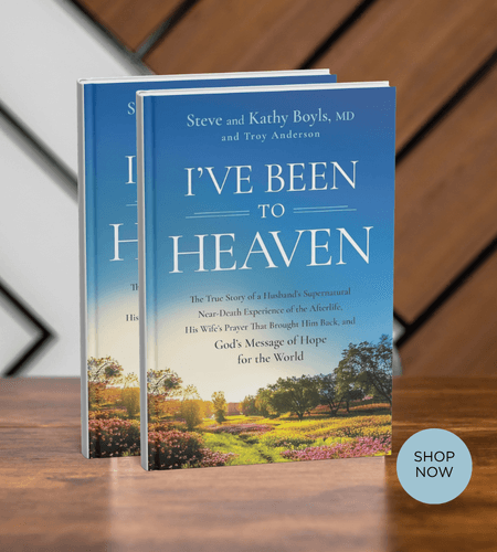 Two copies of the book I've Been to Heaven displayed on a wooden surface.